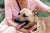 owner holder dog in arms