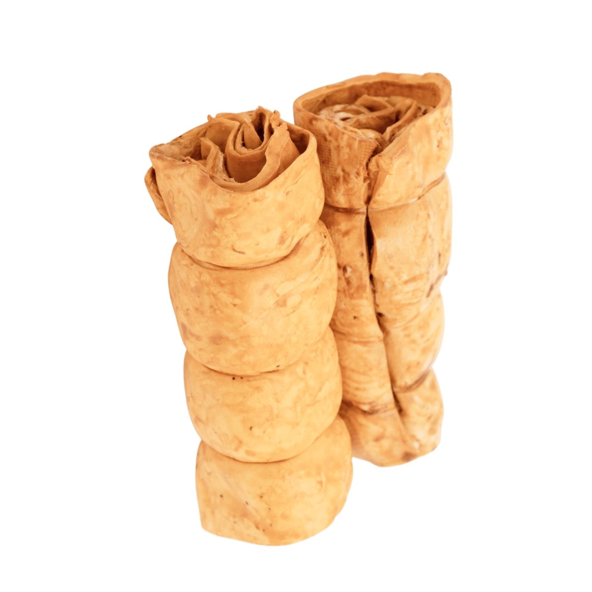 Two medium, rolled brown Peanut Butter Beef Cheek chews from Best Bully Sticks are standing upright against a white background.