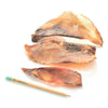 A Beef Scapula Dog Chew (1 lb) from Best Bully Sticks and a pencil on a white surface.