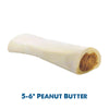 A Peanut Butter Stuffed Shin Bone (3 Pack) from Best Bully Sticks with peanut butter on it.
